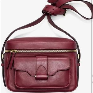 Derek Lam Newton  camera bag . The color is Burgundy